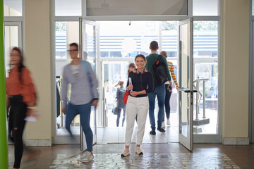 famel student with modern technology in school