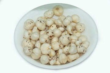 Mumbai , India - 15 March 2021, Euryale ferox commonly known as prickly waterlily or Gorgon Plant or Prickly water lily or Makhana served in a bowl at Mumbai Maharashtra India