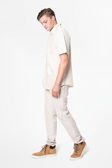 Fototapeta premium Man in beige shirt and pants casual wear fashion full body