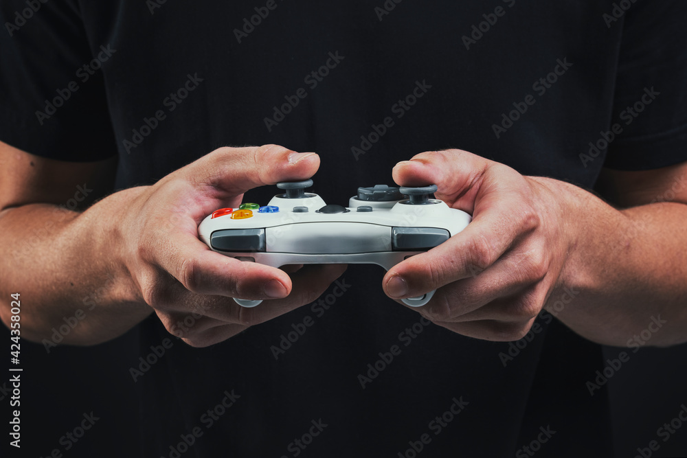 Aufkleber hand playing video game using a game console entertainment technology