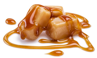 Caramel candies covered with melted sugar caramel isolated on white background.
