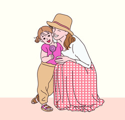 The mother and daughter are looking forward to each other affectionately. hand drawn style vector design illustrations. 