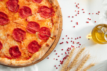 Fresh baked pepperoni pizza on the white background