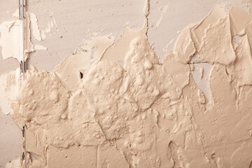 Wall covered with plaster as an abstract background.