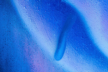 Beautiful bright colorful street art graffiti background. Abstract creative spray drawing fashion colors on the brick walls of the city. Urban Culture gradient texture, copyspace backdrop