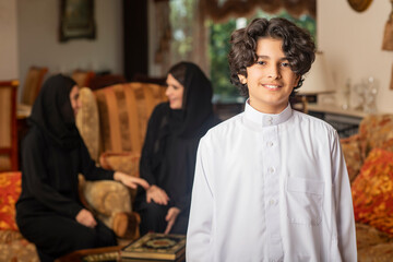 Young arabian boy smiling at home
