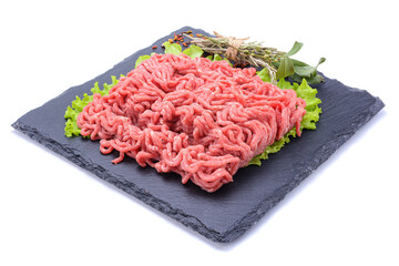 Fresh minced pork and beef and spices on a slate stone.Isolated on a white background, selective...