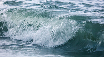 Fototapeta premium Wave in the sea with splashing water.
