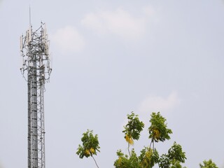 Telephone towers used to broadcast signals at dusk.