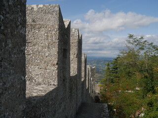 San Marino, the Walls. Closeup of the battlements of the walls that start from the castle and surround the old town.