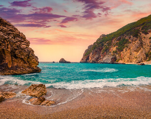 Beautiful marine scenery. Splendid summer view of Gyali beach. Stunning morning seascape of Ionian Sea. Fantastic sunrise on Corfu island, Greece, Europe. Beauty of nature concept background.