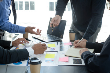 Meeting business team leaders about charts, financial graphs showing results are analyzing and calculating planning strategies, business success building processes