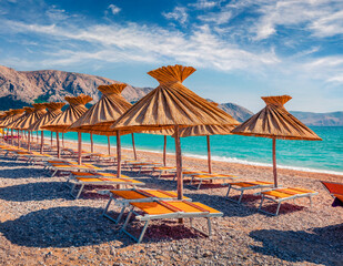 Beautiful resort scenery. Sunny morning scene of Baska Beach. Adorable summer seascape of Adriatic sea, Baska town location, Krk island, Kvarner bay archipelago, Croatia, Europe.