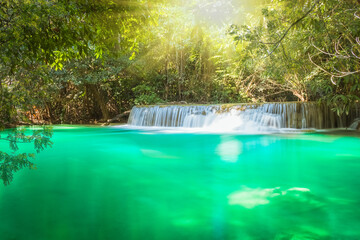 Obraz na płótnie Canvas Huay Mae Khamin waterfall in Kanchanaburi, Thailand South east asia Jungle landscape with amazing turquoise water of cascade waterfall at deep tropical rain forest. travel landscape and destinations