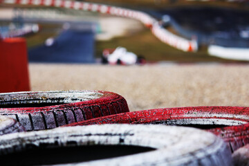 Formula race car racing at high speed on speed track with motion blur