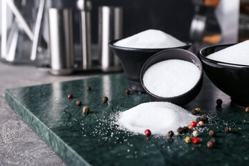 Bowls of salt on table