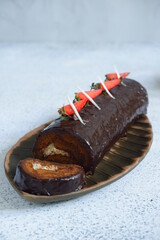 chocolate roll cake with glaze