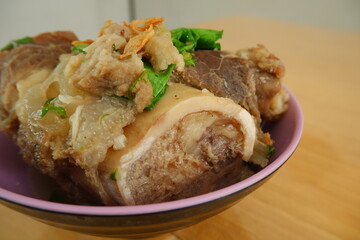 A bowl of beef bone marrow soup