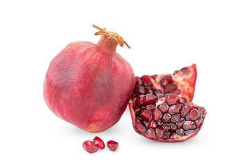 Whole pomegranate and it's parts isolated on white background
