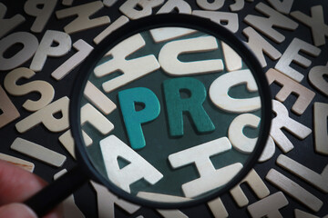 PR Public Relation, text words typography written on wooden, life and business motivational inspirational