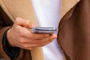 closeup of hands with mobile phone