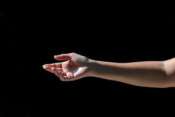 The girl's hands show various gestures on black background
