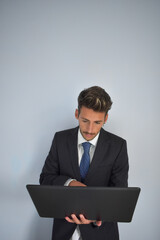 businessman in suit working at computer.