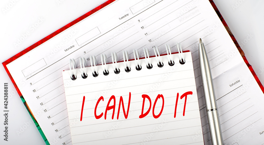 Poster i can do it text on the notebook on the diary,business