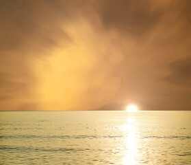 Sunrise at the edge of the sea and blur sky background. Golden hour.