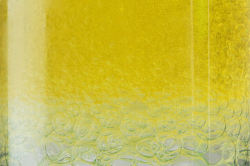Yellow liquid texture close up