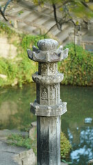 Obraz premium The old stone sculpture view located in the old and classical Chinese garden