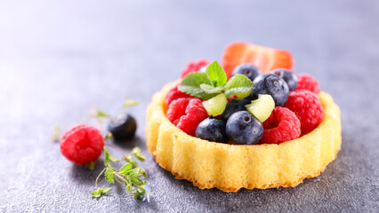 delicious fruit tart with strawberry,  blueberry and raspberry