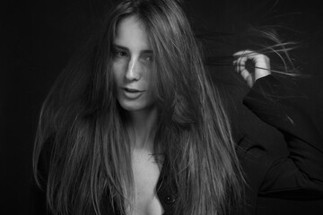 Black and white portrait of a young girl with long hair