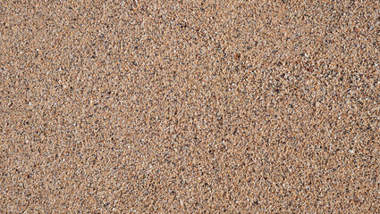 Texture of coarse sand on a beach in Hawaii.
