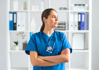 Professional medical doctor working in hospital office, Portrait of young and attractive female physician in protective mask.