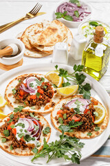 ground Lamb Flatbreads with yogurt, top view