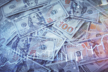 Multi exposure of forex chart drawing over us dollars bill background. Concept of financial success markets.