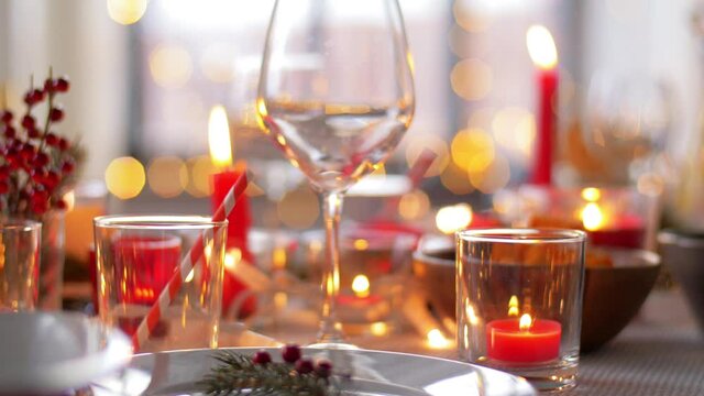 winter holidays, dinner party and celebration concept - christmas table serving at home