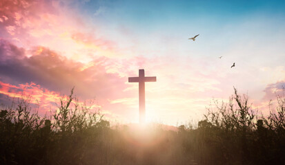 Easter concept: cross in the morning at sunrise
