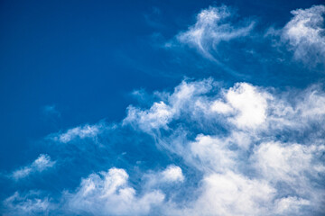 Obraz premium beautiful blue background with clouds and moon and clouds pattern.