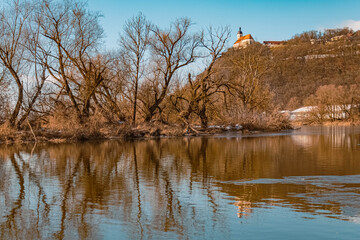 Beautiful winter landscape with reflections at the famous Bogenberg, Danube, Bavaria, Germany