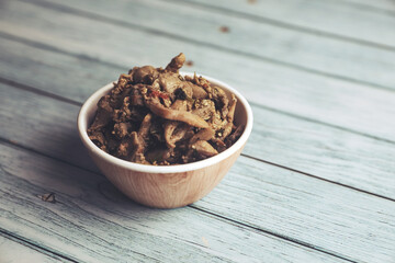 Fototapeta na wymiar Delicious fried mushrooms in bowl 