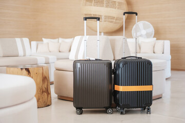 Two Black Luggage bag or Suitcase in modern hotel during check in. Time to travel, service,...
