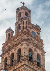 Fototapeta na wymiar Our Lady of Granada magnificent tower of brick. Llerena, Spain
