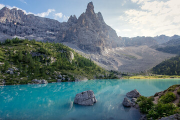 Clear blue lake in the dolomites, lago di sorapis in italy at daylight