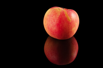 Fototapeta na wymiar red apple on a black background