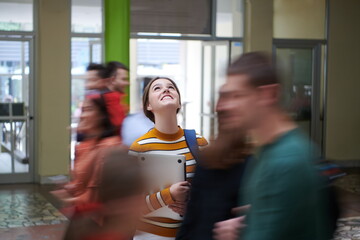 famel student with modern technology in school