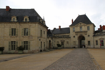 Fototapeta na wymiar gate and buildings at the fontevraud abbey in france