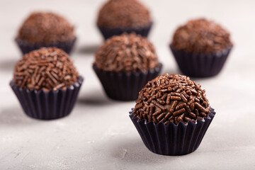 Chocolate brigadeiro with granulated chocolate, traditional Brazilian sweet.