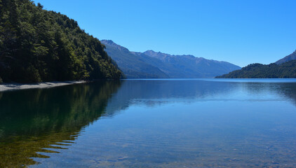 Naklejka premium lake rivadavia, patagonia argentina blue water mountain and forest
